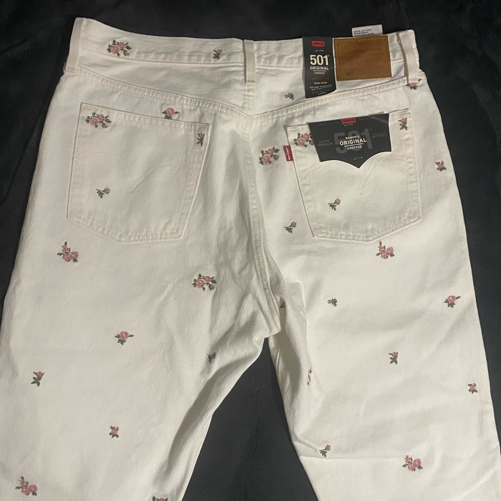 Levi’s white floral cropped jeans